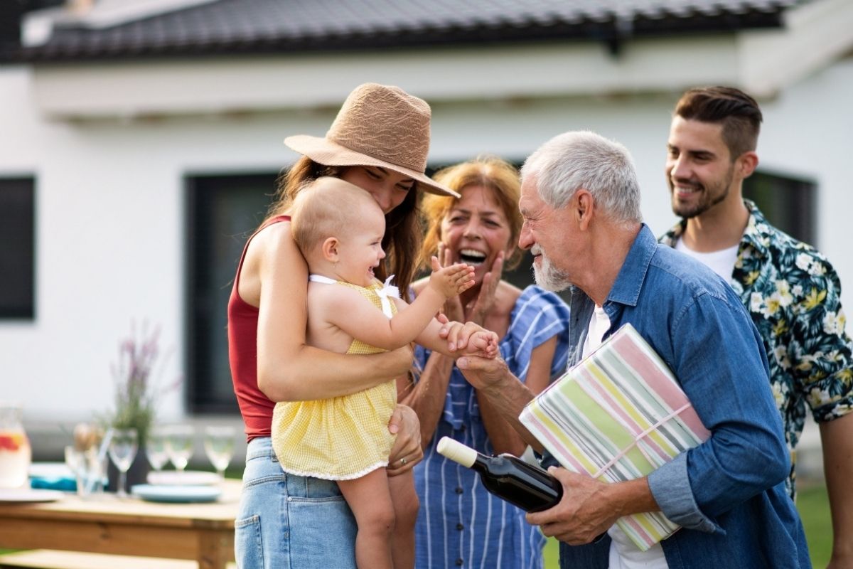 Financial Adviser Perth - Grandparent meeting granddaughter showing connection warmth and family values