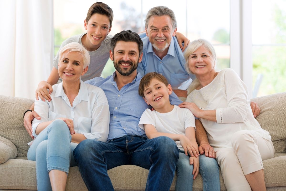 Financial Adviser Perth - Happy family smiling together showing confidence and shared purpose